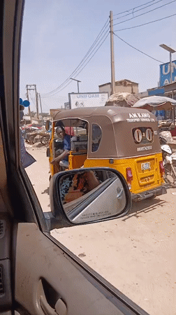 Street scene captured from vehicle in Badiko, Nigeria