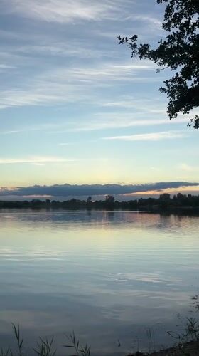 Sunset by a quiet lake in Bezliudivka, Ukraine