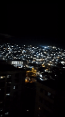 Nighttime cityscape views captured across Caracas hills