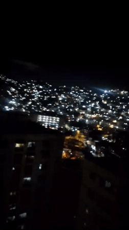 Nighttime cityscape views captured across Caracas hills