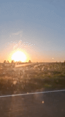 Woman filmed during sunset car journey in Russia
