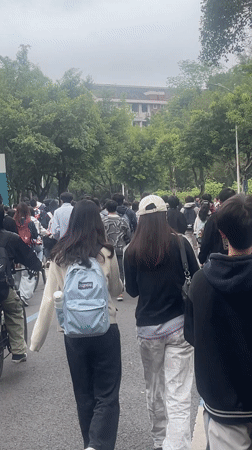 Students gather on campus paths in Chongqing