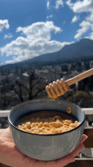 Morning breakfast with honey on Sofia balcony overlooking mountains