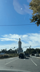 Mercedes vehicle drives through sunny Buenos Aires streets
