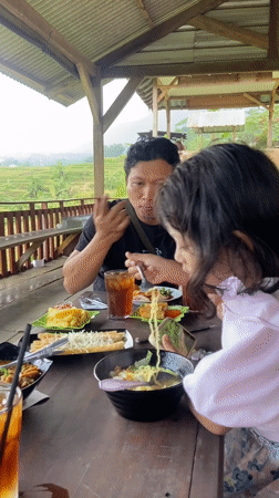Family breakfast outing documented in rural Indonesia villages