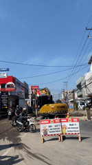 Road construction and everyday street life in Kediri City
