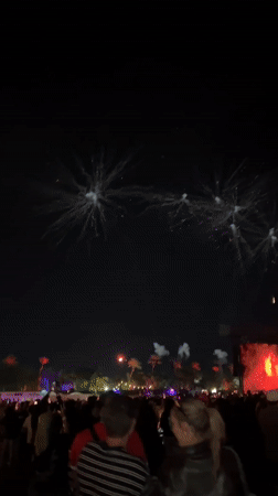 Nighttime outdoor concert with fireworks draws crowds in Indio