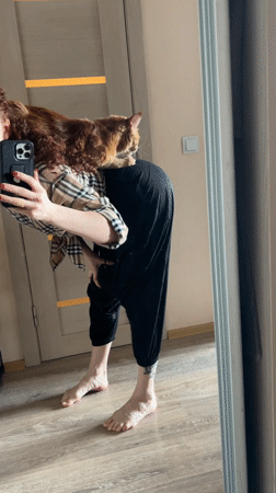 Woman in plaid shirt observed at Saint Petersburg residence