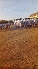 Marching band performs on dirt field in Maiduguri