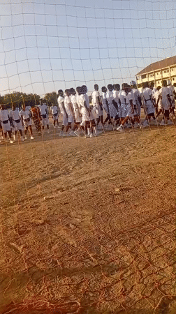 Marching band performs on dirt field in Maiduguri