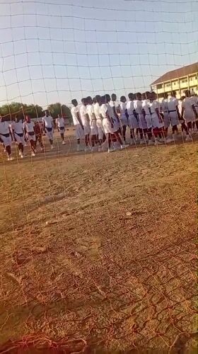 Marching band performs on dirt field in Maiduguri