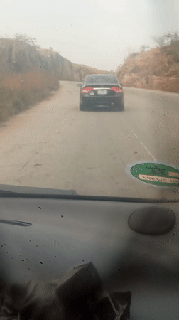 Motorist records drive through rocky terrain near Panshanu, Nigeria