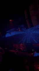 Nightclub scene with DJ booth captured in North Kuta