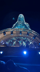 Outdoor festival night in Montenegro: DJ, holograms, and crowd energy