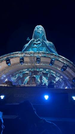 Outdoor festival night in Montenegro: DJ, holograms, and crowd energy