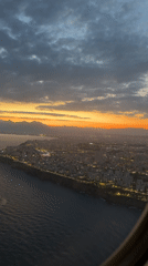 Family departure flight from Antalya Airport captures sunset rainbow