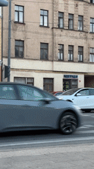 Evening street life in central Riga, trams and all