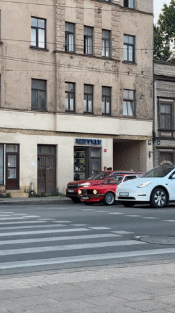 Evening street life in central Riga, trams and all