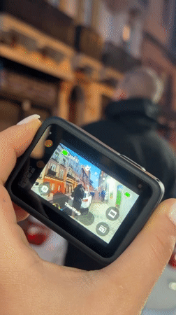 Person films Madrid streets with GoPro in TimeWarp mode