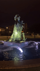 Nighttime fountain and waterfront scene documented in A Coruña