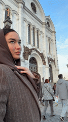 Woman visits Cathedral of Christ the Savior in Moscow