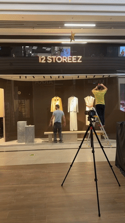 Film crew sets up early morning shoot at Perm mall