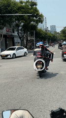 Morning motorcycle traffic captured on Da Nang streets
