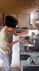 Coffee preparation at local café in Lhokseumawe