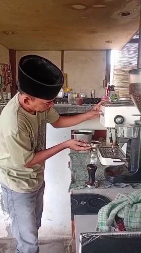 Coffee preparation at local café in Lhokseumawe