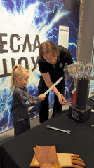 Tesla coil demonstration with child draws crowd in Kamyshin