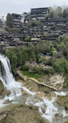 Tourist visits documented at Furong Ancient Town waterfall, China