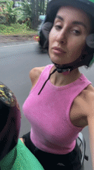 Scooter selfie and playful kitten captured in Kuta Selatan