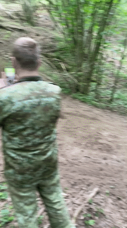 Dirt bikers navigate forest trails in rural Belarus