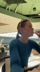 Woman enjoys Burger King meal at Perm shopping mall