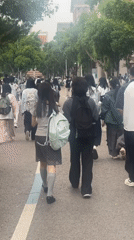 Morning scenes capture student life, cycling, lab work in Chongqing