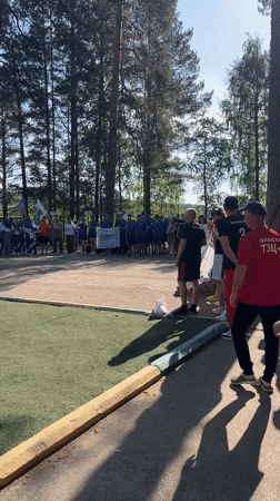 Sports team gathering with flags at Chaykovsky complex