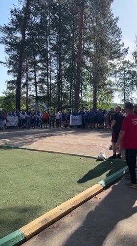 Sports team gathering with flags at Chaykovsky complex