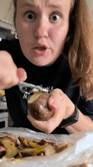 Peeling and chopping potatoes in a Russian kitchen