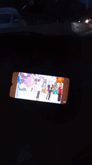 Phone records stage performance with multiple performers in Uzbekistan
