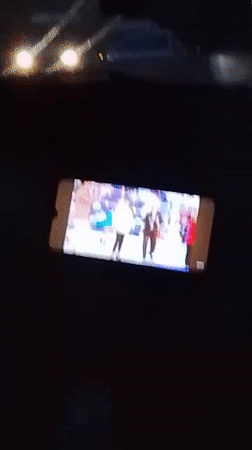 Phone records stage performance with multiple performers in Uzbekistan