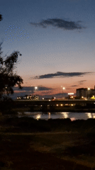 Twilight waterfront scene captured along Plovdiv river at dusk