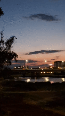 Twilight waterfront scene captured along Plovdiv river at dusk
