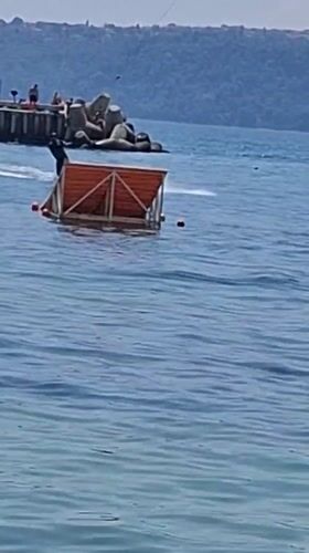 Wakeboarding tricks off the Varna coast on a sunny summer morning