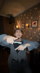 Solo dancing in a dimly lit Astana room