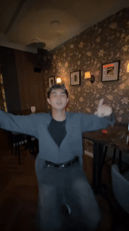 Solo dancing in a dimly lit Astana room