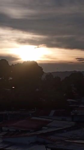Sun breaks through clouds over Tinaquillo, Venezuela