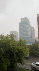 Rainy afternoon life documented across Yekaterinburg residential areas