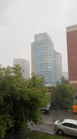 Rainy afternoon life documented across Yekaterinburg residential areas