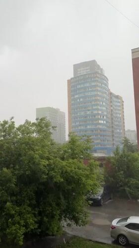 Rainy afternoon life documented across Yekaterinburg residential areas