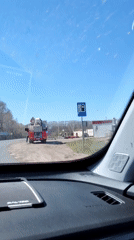 Fire truck stops on roadside in Rusalevka, Russia